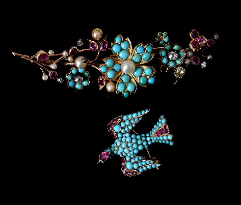 A-mid-19th-century-turquoise-and-ruby-St-Esprit-brooch,-circa-1850,-set-with-circular-cabochon-rubies