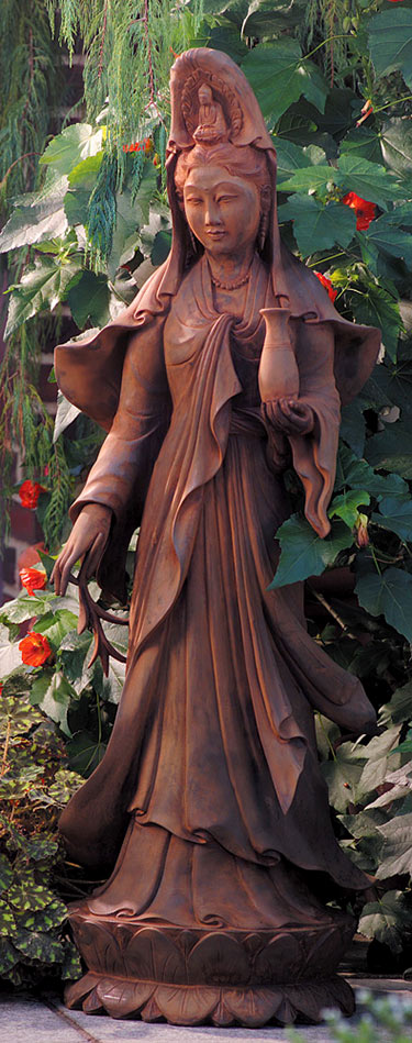 Garden-Kuan-Yin-with-Vessel-StatueKuan-Yin-means-she-who-hears-the-cries-of-the-world.-Hand-cast-of-resin-from-a-Balinese-wood-carving-and-finished-with-rust-patina