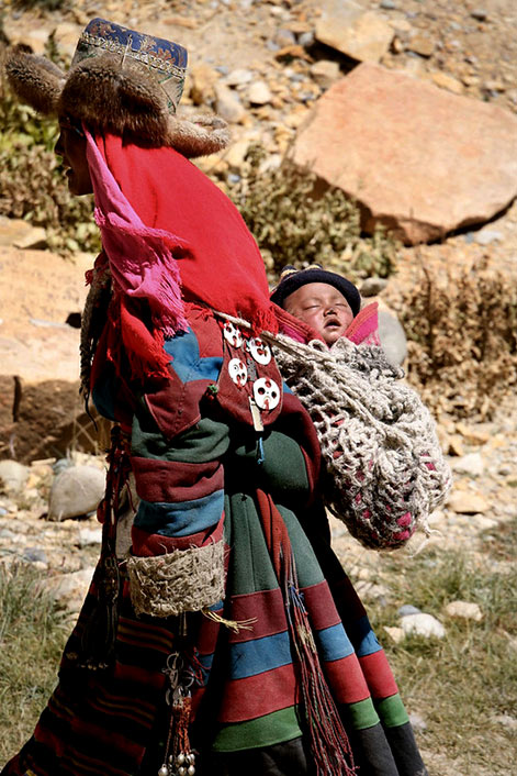 Tibetan-Buddhist-Pilgrim-Mother-and-Babe-Completing-a-Kora-Tirthapuri-Tibet-China--