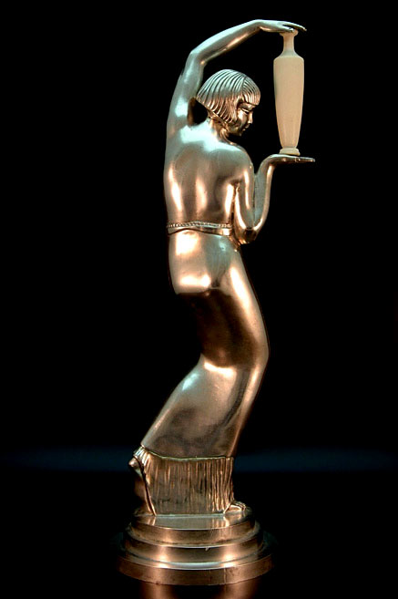 Art Deco bronze female posing with pottery vessel