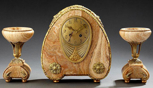 Trim-fireplace-clock in white marble veined beige decorated with floral motifs in gilded bronze.Aguttes
