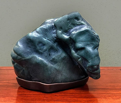 seated ox suiseki