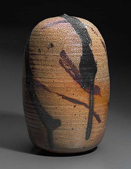 Toshiko TakaezuClosed form with reddish brown salt glaze. Very small aperture at the top