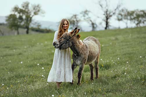 Martyna Nysk Photography-girl in white dress with donkey