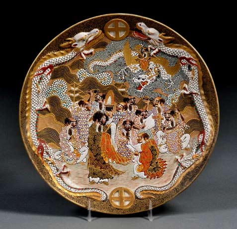 Satsuma Plate Japan 20th century round with three dragons in low relief 