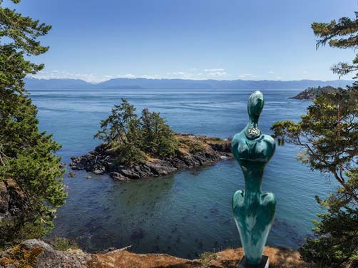Steve Nicknell sculpture at coast of East Sooke Regional Park, British Columbia, Canada
