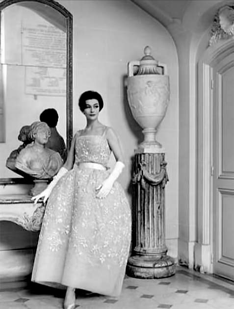 Anne Gunning in evening gown by Marc Bohan for Dior, 1961
