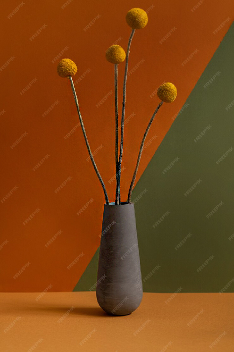 vase-with-several-yellow-dried-wildflowers